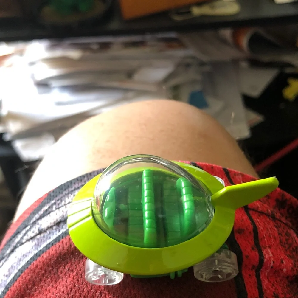 Green Electronic Wearable Tracker - Compact Clip-On